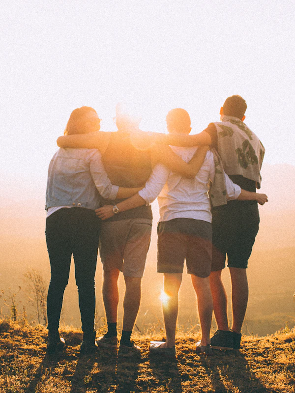 Friends gathering together outdoors